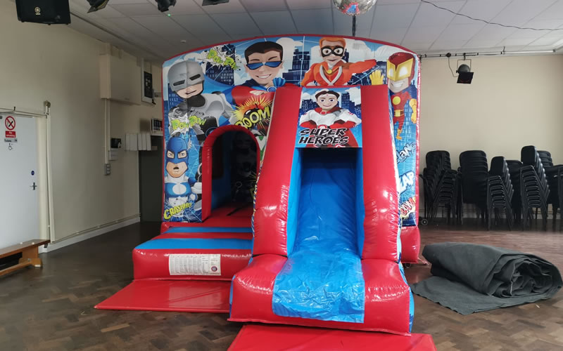 Super Hero Bouncy Castle with Slide