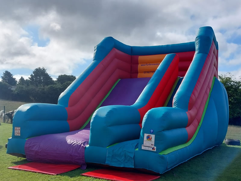 Huge inflatable event slide hire Wales