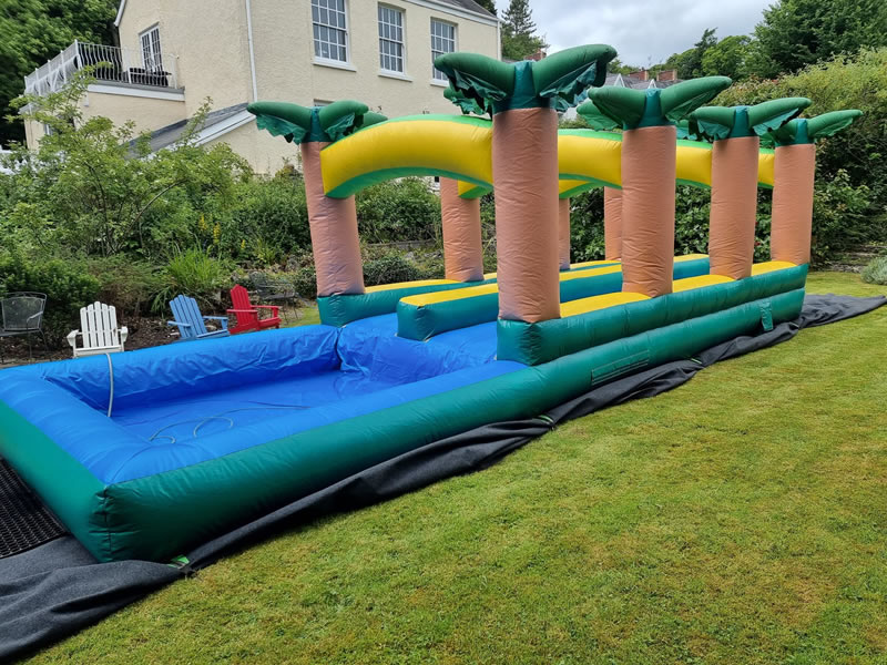 Palm tree slip n slide hire Wales